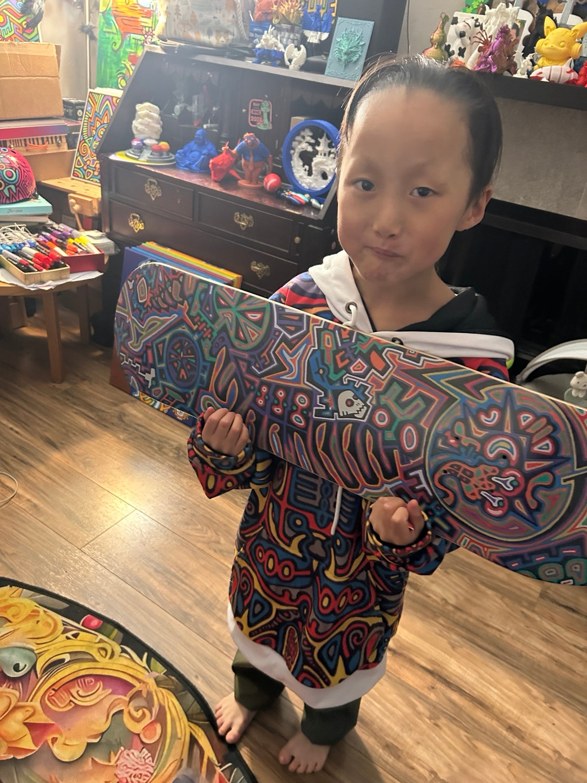 Hand-painted skate deck by James S. Chen