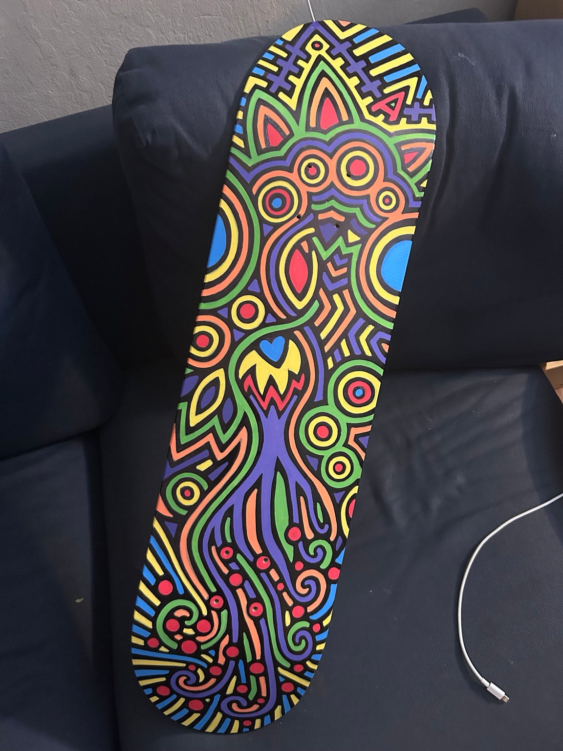 Hand-painted skate deck by James S. Chen