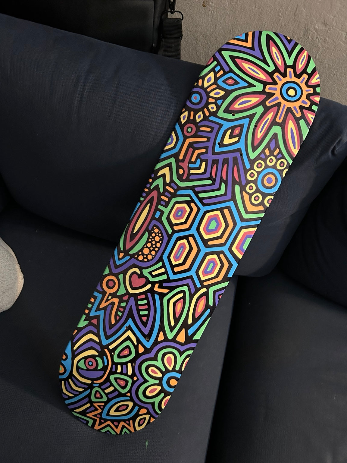 Hand-painted skate deck by James S. Chen